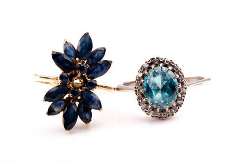 Lot 616 - A 9ct yellow gold and sapphire dress ring, set...