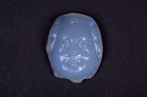 Lot 310 - A Persian carved chalcedony cameo, the male...