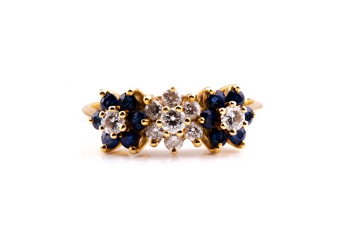 Lot 598 - An 18ct yellow gold, diamond and sapphire...