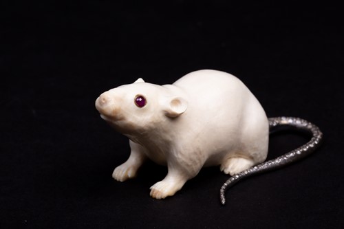 Lot 319 - A Russian carved ivory rat with silver and...