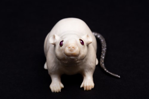 Lot 319 - A Russian carved ivory rat with silver and...