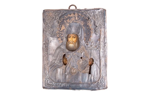 Lot 381 - A small rectangular Russian icon with silver...