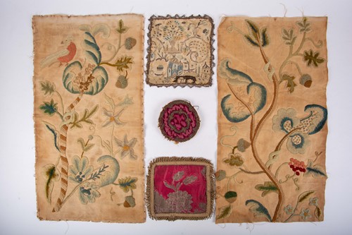 Lot 395 - A pair of English 18th century crewelwork...