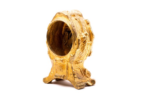 Lot 533 - A 19th century gilt metal desk clock, in the...