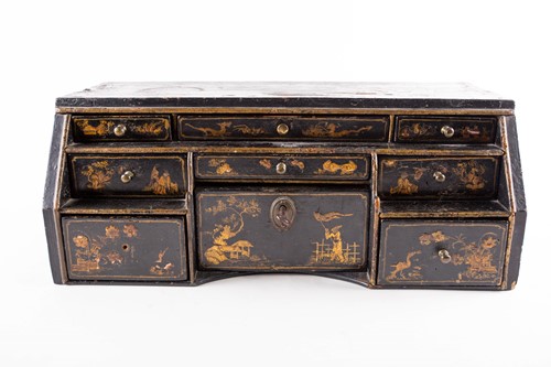 Lot 400 - A 19th century lacquered table-top desk with...