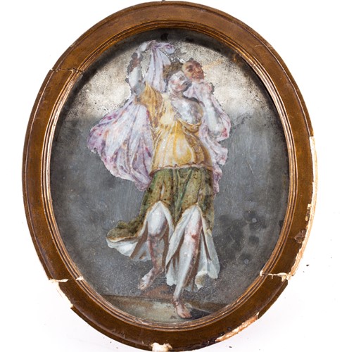Lot 203 - An 18th century reverse painted oval mirror,...