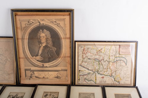 Lot 121 - A large collection of framed and glazed maps...