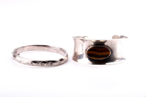 Lot 487 - A Danish silver cuff bangle, inset with an...