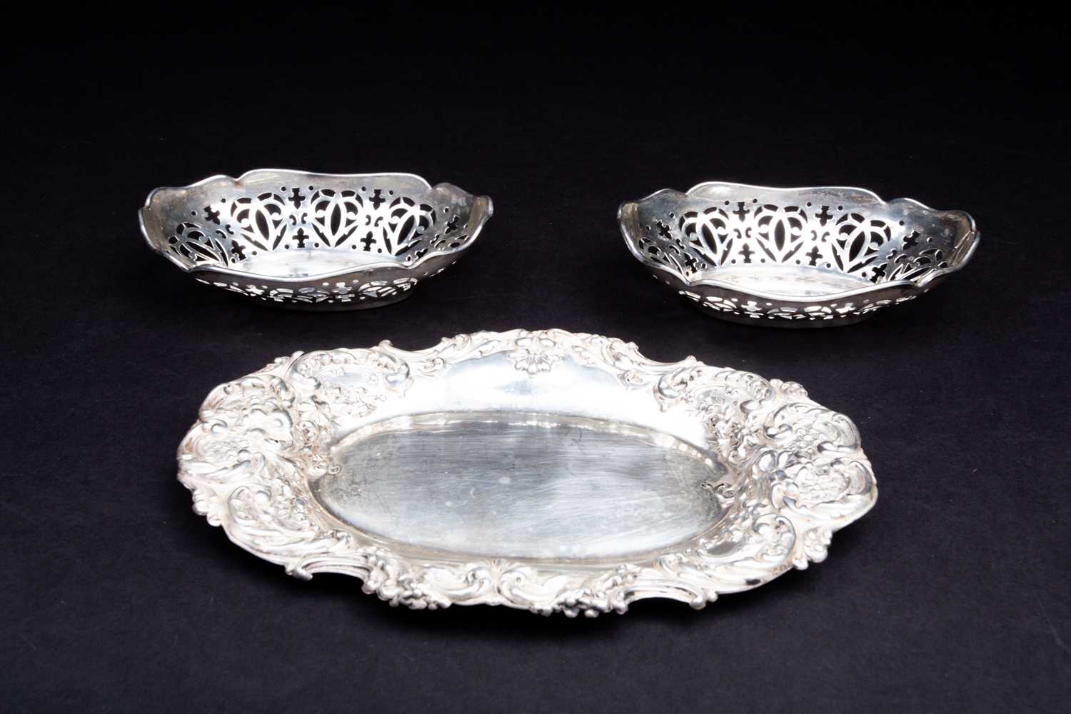 Lot 9 - A pair of silver bon bon dishes of oval design,...