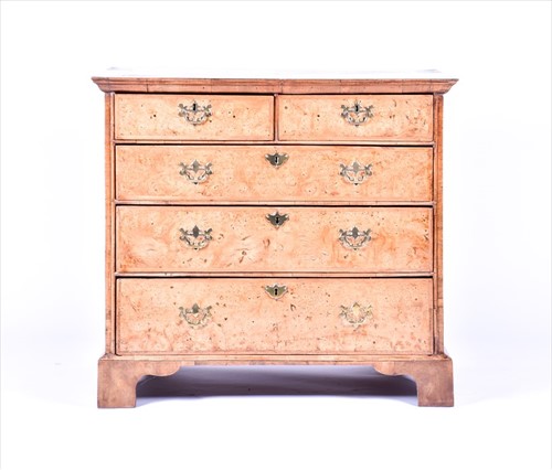 Lot 39 - An 18th century figured walnut chest of...