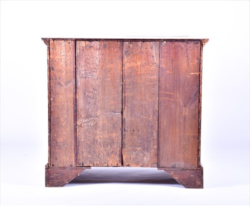 Lot 39 - An 18th century figured walnut chest of...