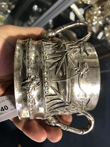Lot 140 - A Chinese silver tea caddy, sugar bowl and...