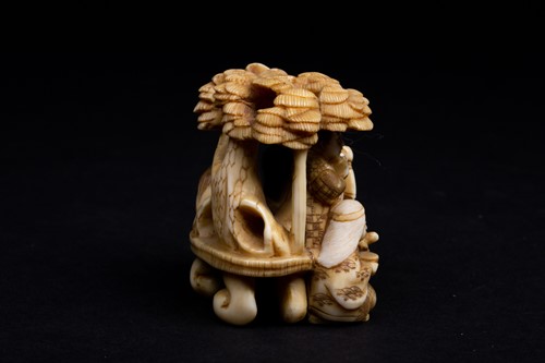 Lot 259 - A Japanese ivory okimono, Meiji period, carved...