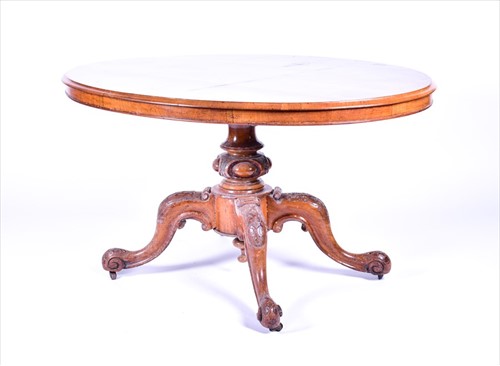 Lot 38 - A Victorian figured walnut oval loo table the...