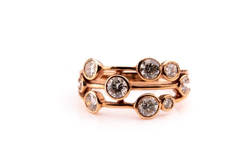 Lot 614 - An 18ct rose gold and diamond ring, in the...