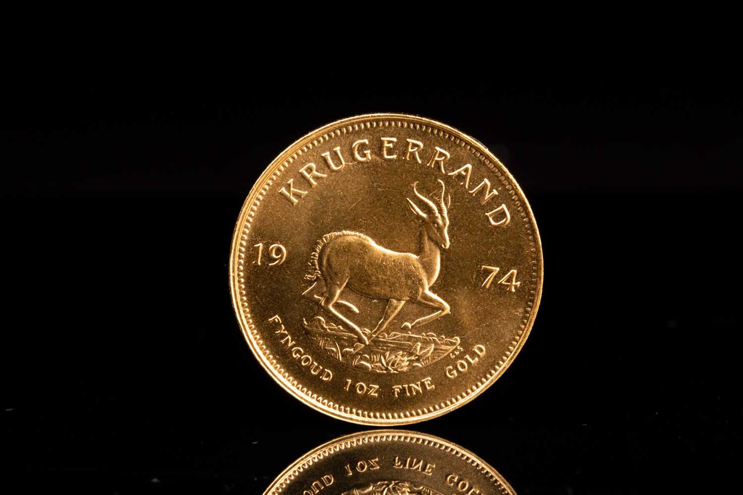 Lot 239 - A 1oz 22ct gold South Africa Krugerrand, 1974.