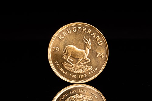 Lot 256 - A 1oz 22ct gold South Africa Krugerrand, 1974.