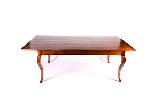 Lot 139 - A large French cherrywood dining table, the...
