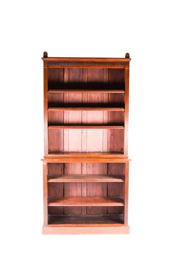 Lot 138 - An Arts and Crafts mahogany double bookcase,...