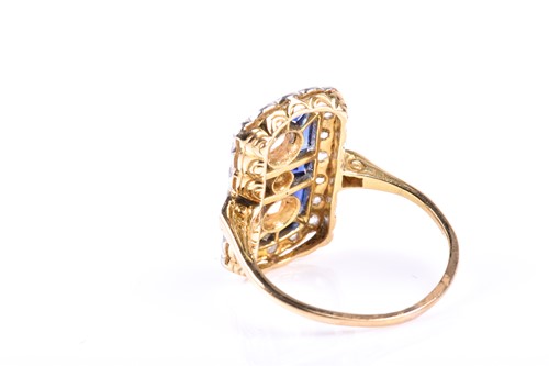 Lot 765 - An Art Deco style sapphire and diamond ring,...