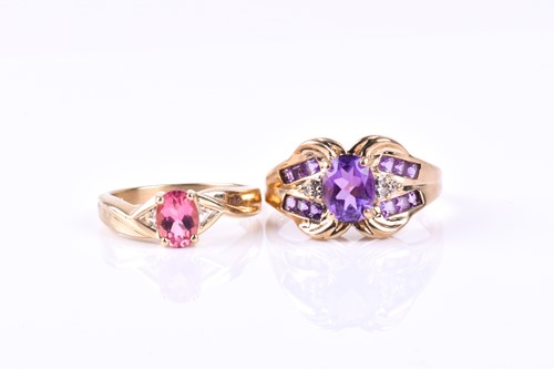 Lot 855 - A yellow metal and amethyst dress ring the...