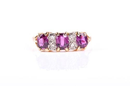 Lot 725 - A seven stone ruby and diamond half hoop ring,...