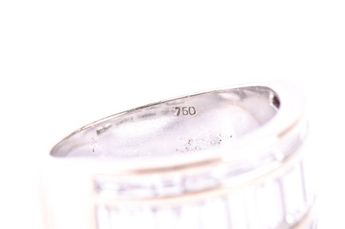 Lot 335 - A three row diamond ring, the central band of...