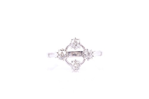 Lot 809 - A four stone diamond ring, the mixed old cut...