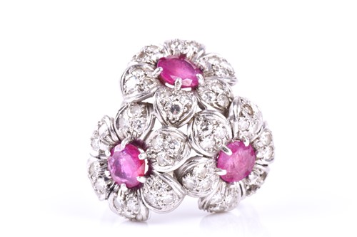 Lot 495 - A ruby and diamond cocktail ring, composed of...