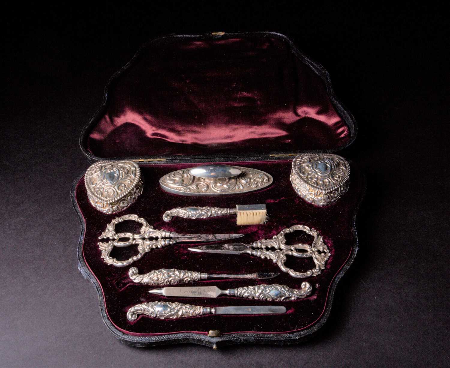Lot 110 - A matched Victorian silver vanity set, in...