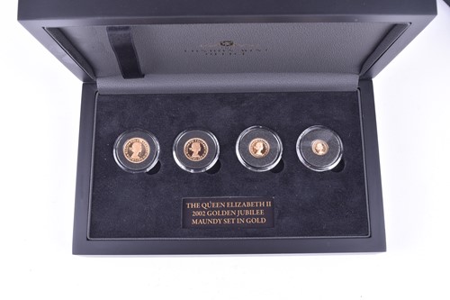 Lot 236 - The Golden Jubilee 2002 Maundy Set in 22ct...