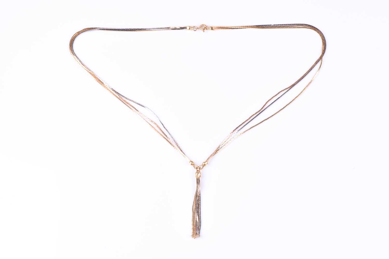 Lot 384 - A tri-coloured gold multi-strand necklace,...