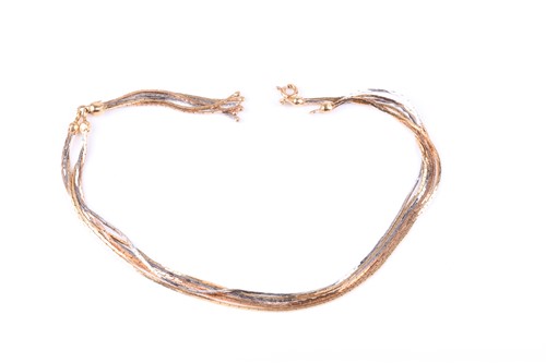 Lot 384 - A tri-coloured gold multi-strand necklace,...