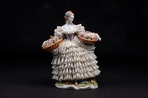 Lot 344 - A Sitzendorf Dresden style 'lace' figure,...