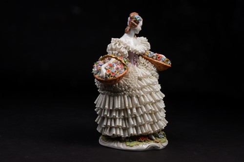 Lot 344 - A Sitzendorf Dresden style 'lace' figure,...