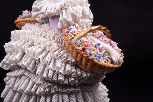Lot 344 - A Sitzendorf Dresden style 'lace' figure,...
