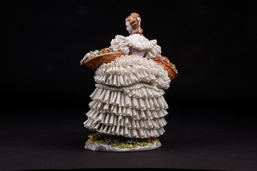 Lot 344 - A Sitzendorf Dresden style 'lace' figure,...