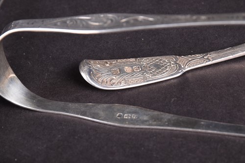 Lot 105 - An early Victorian fiddle pattern fish slice,...