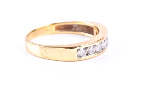 Lot 362 - A seven stone half hoop diamond ring, the...