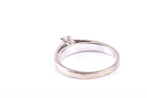 Lot 383 - A single stone diamond ring, the round...