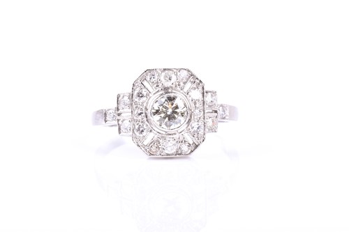 Lot 787 - A platinum and diamond plaque ring, the...