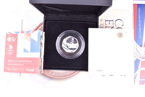 Lot 235 - A Royal Mint Britannia five coin silver proof...