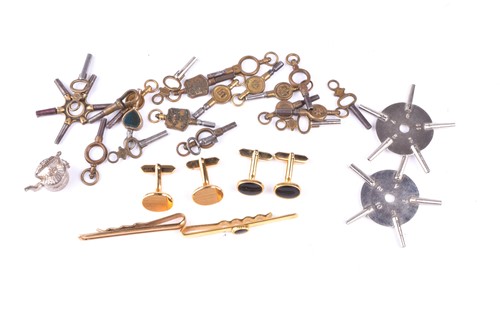 Lot 709 - A group of 18 various pocket watch keys (base...