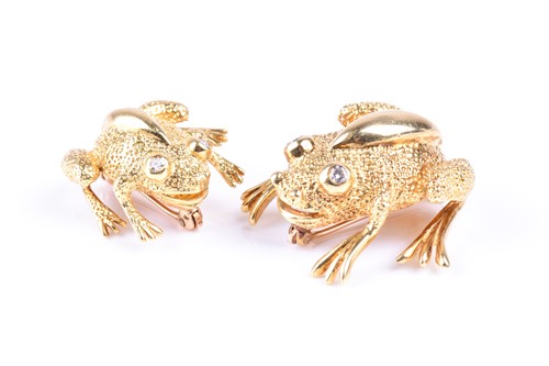 Lot 728 - Tiffany. A pair of diamond set frog brooches,...