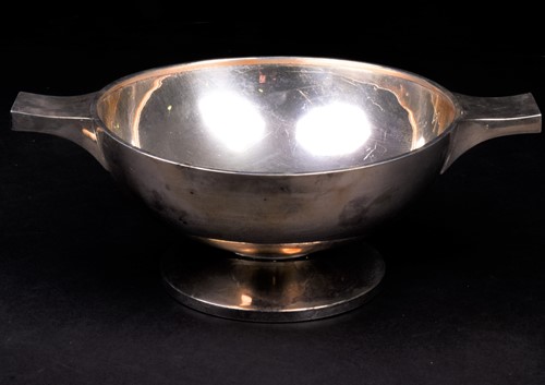 Lot 148 - A George VI silver twin-handled bowl of art...