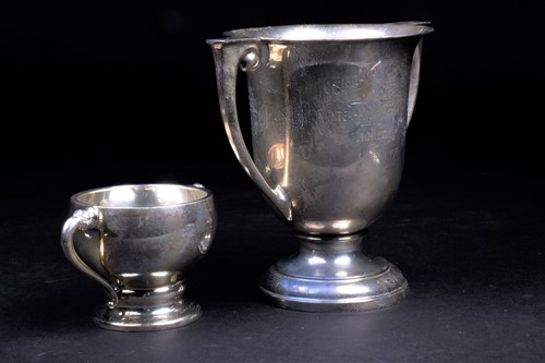 Lot 152 - Two mid-20th century silver trophies, the...
