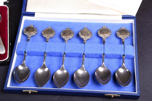 Lot 87 - A large group of cased silver and white metal...