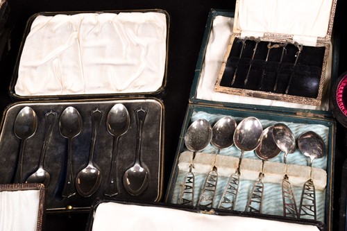 Lot 87 - A large group of cased silver and white metal...