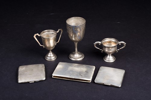 Lot 76 - A small collection of silver items, including...