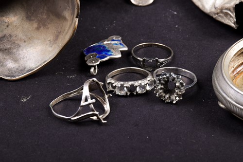 Lot 13 - A collection of silver findings, including...